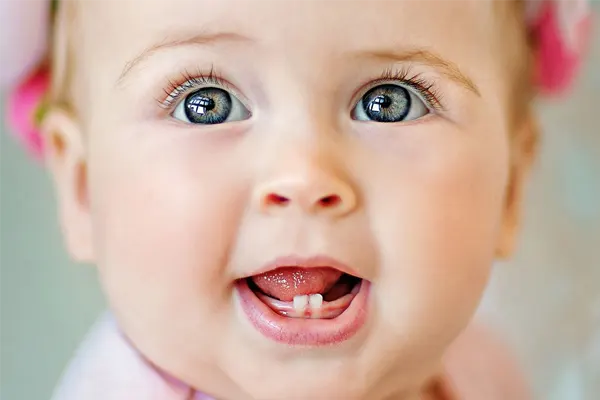 علت سخت دندان درآوردن کودک